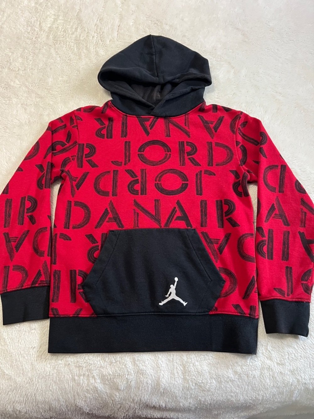 Boy’s Jordan Red and Black Allover Logo Pullover Hoodie. Boy’s Medium.